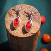 Aretes huayruro gota